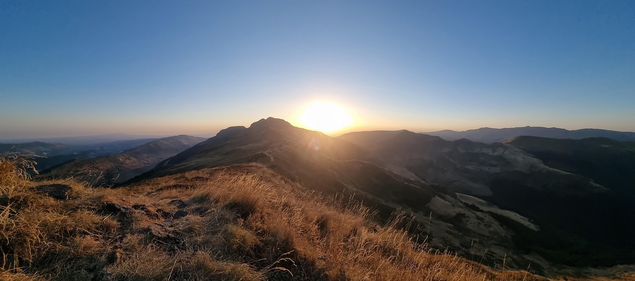 Sunset over Puy Mary with orange sky