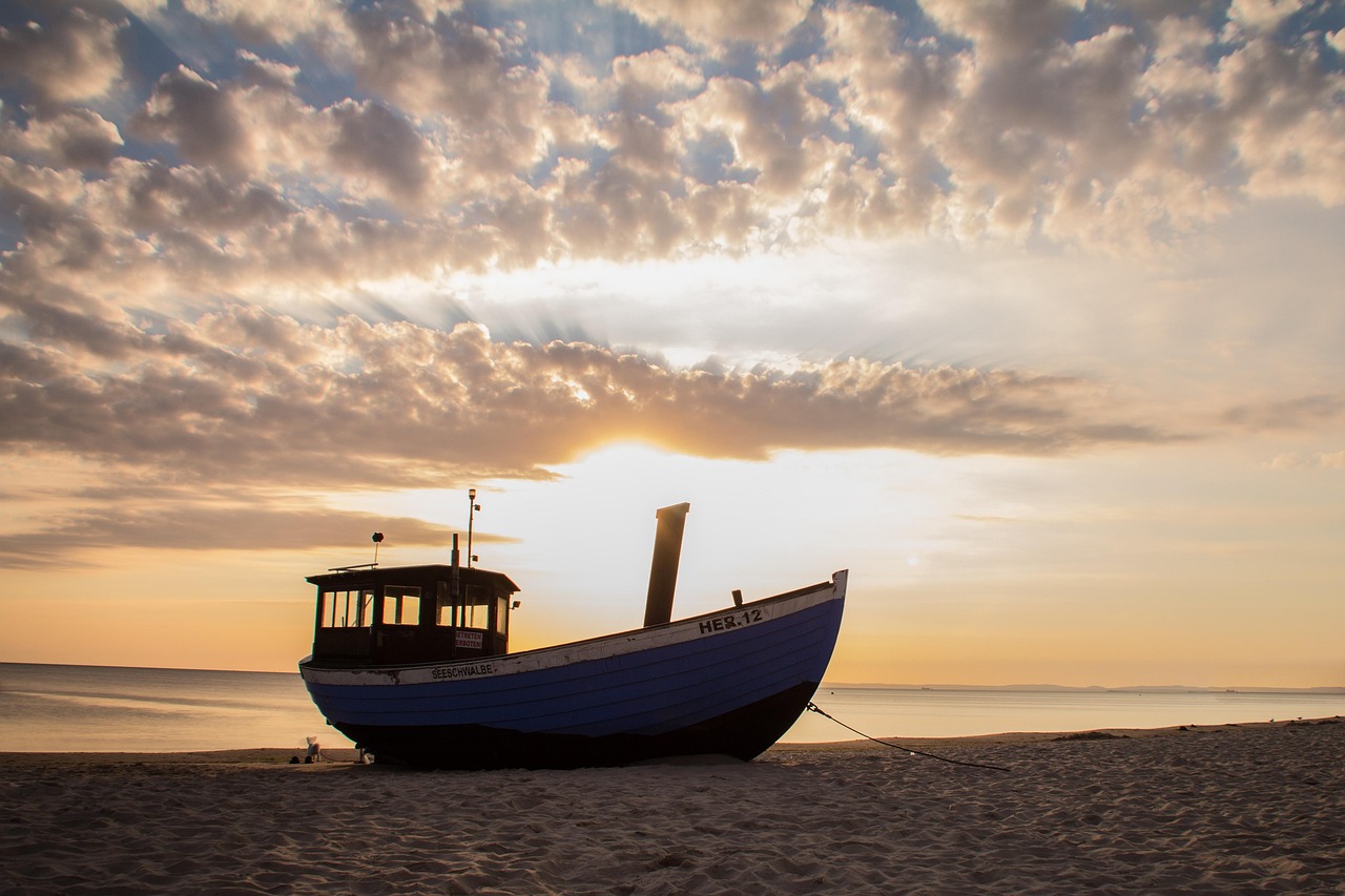 Sunset over a Baltic Sea Coast pier with people strolling