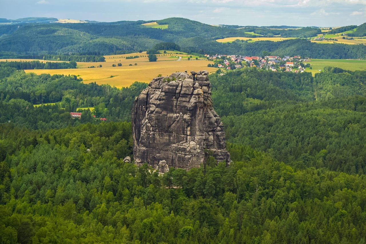 Climbers on Falkenstein rock tower in Saxon Switzerland