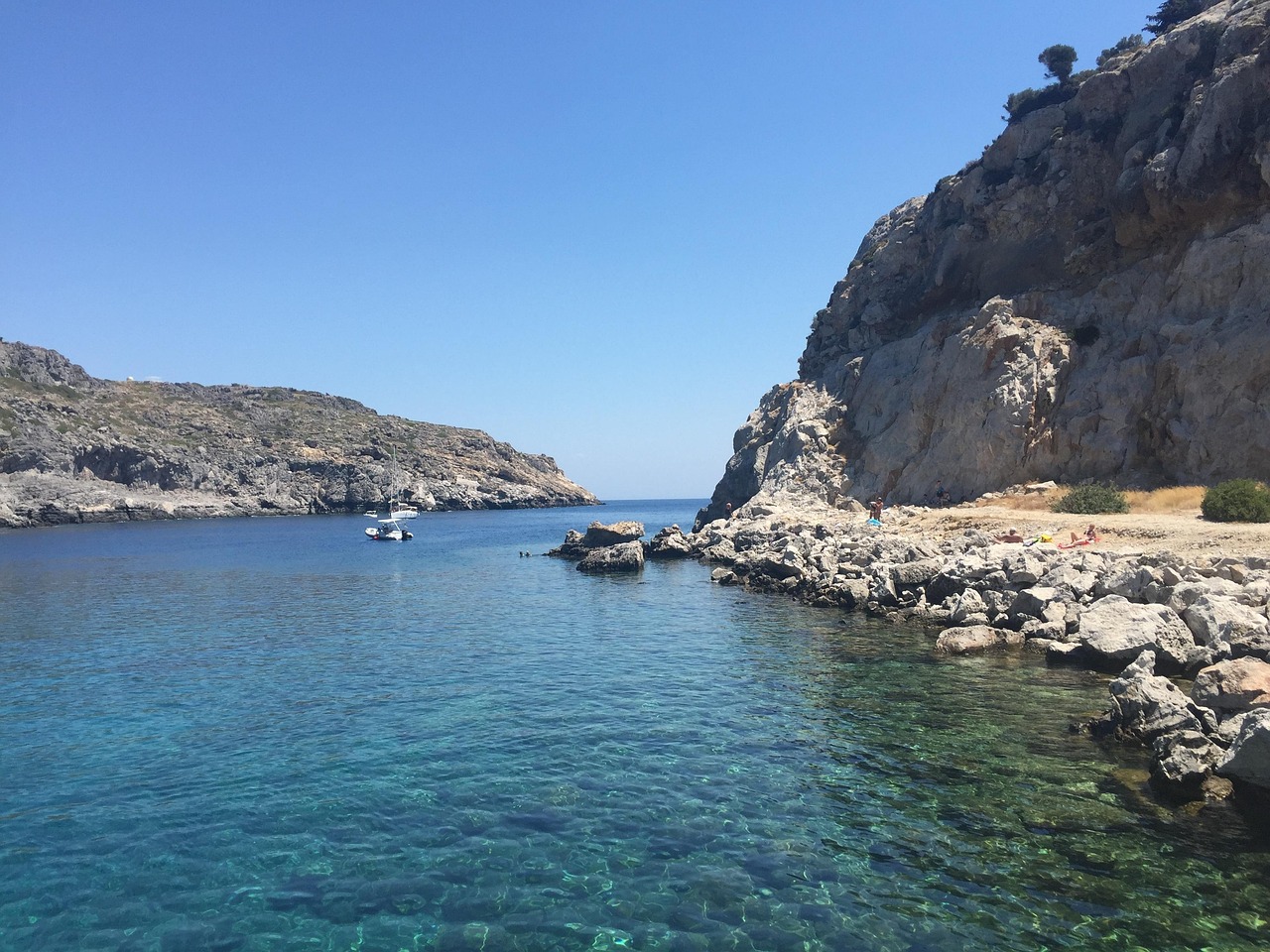 Faliraki Beach in Rhodes with sunbeds and shallow waters