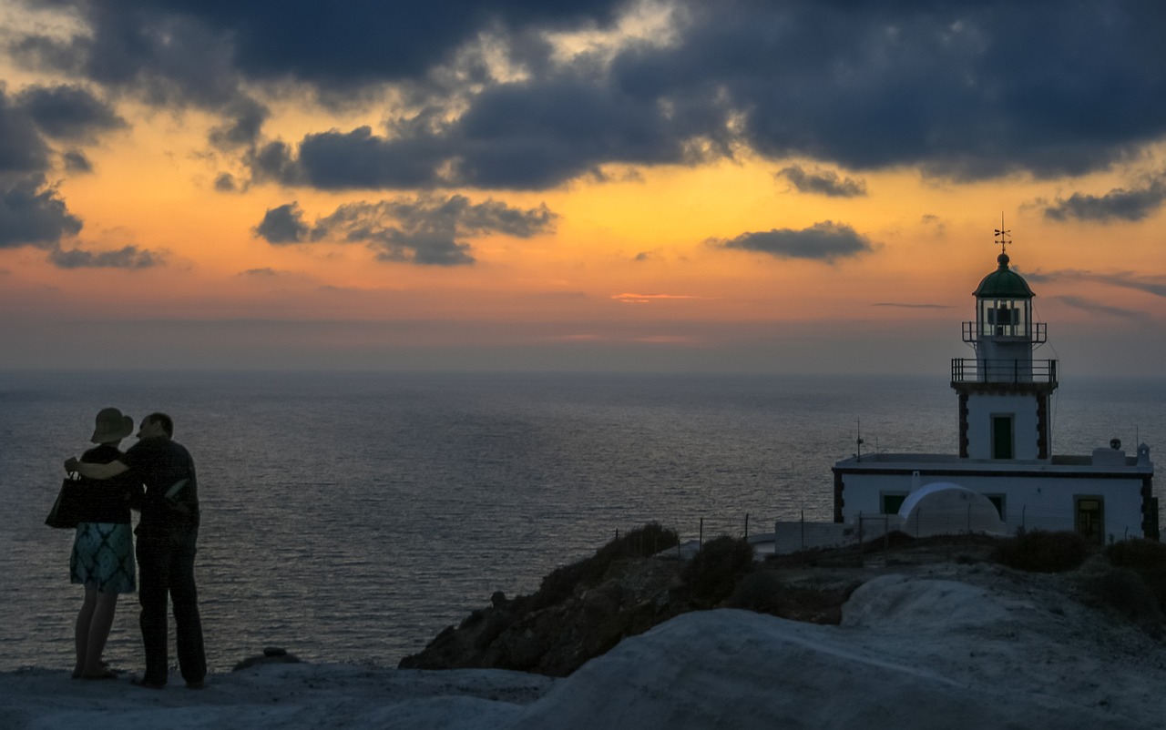 Akrotiri lighthouse sunset view in Santorini