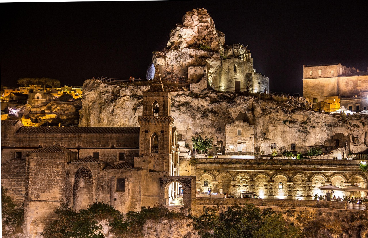 Panoramic view of Matera Sassi cave dwellings at sunset