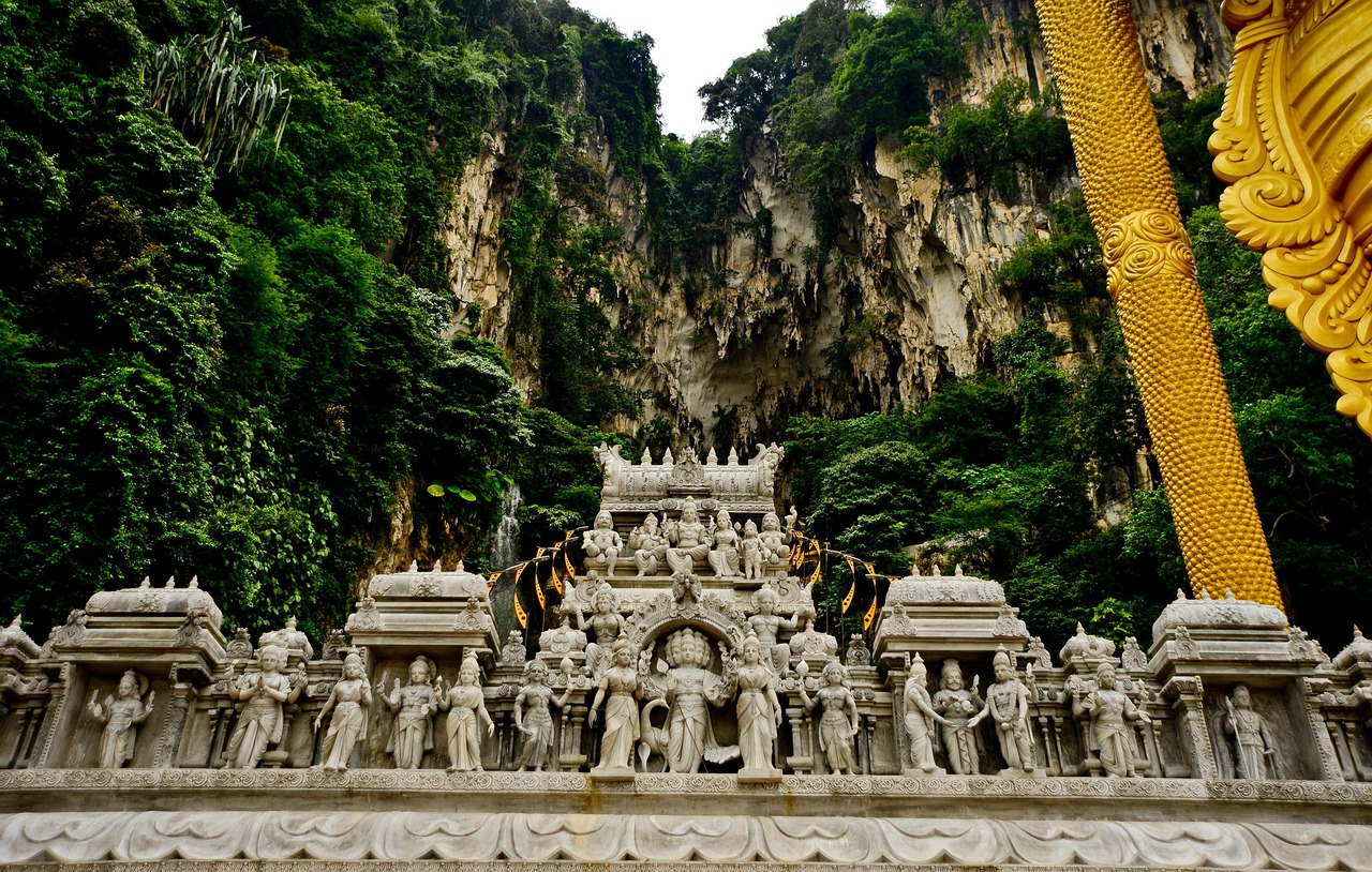 Batu Caves with colorful steps and Lord Murugan statue