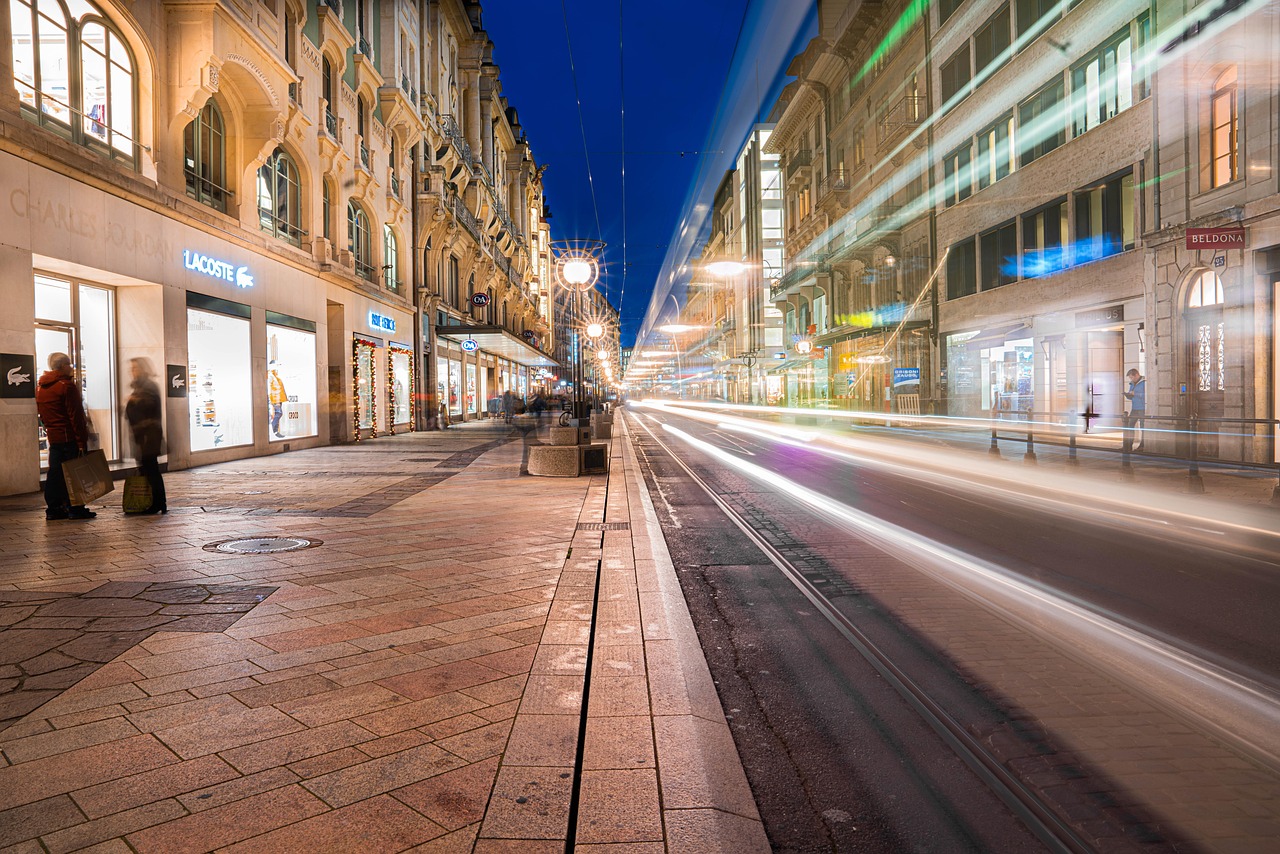 Geneva tram running through city street