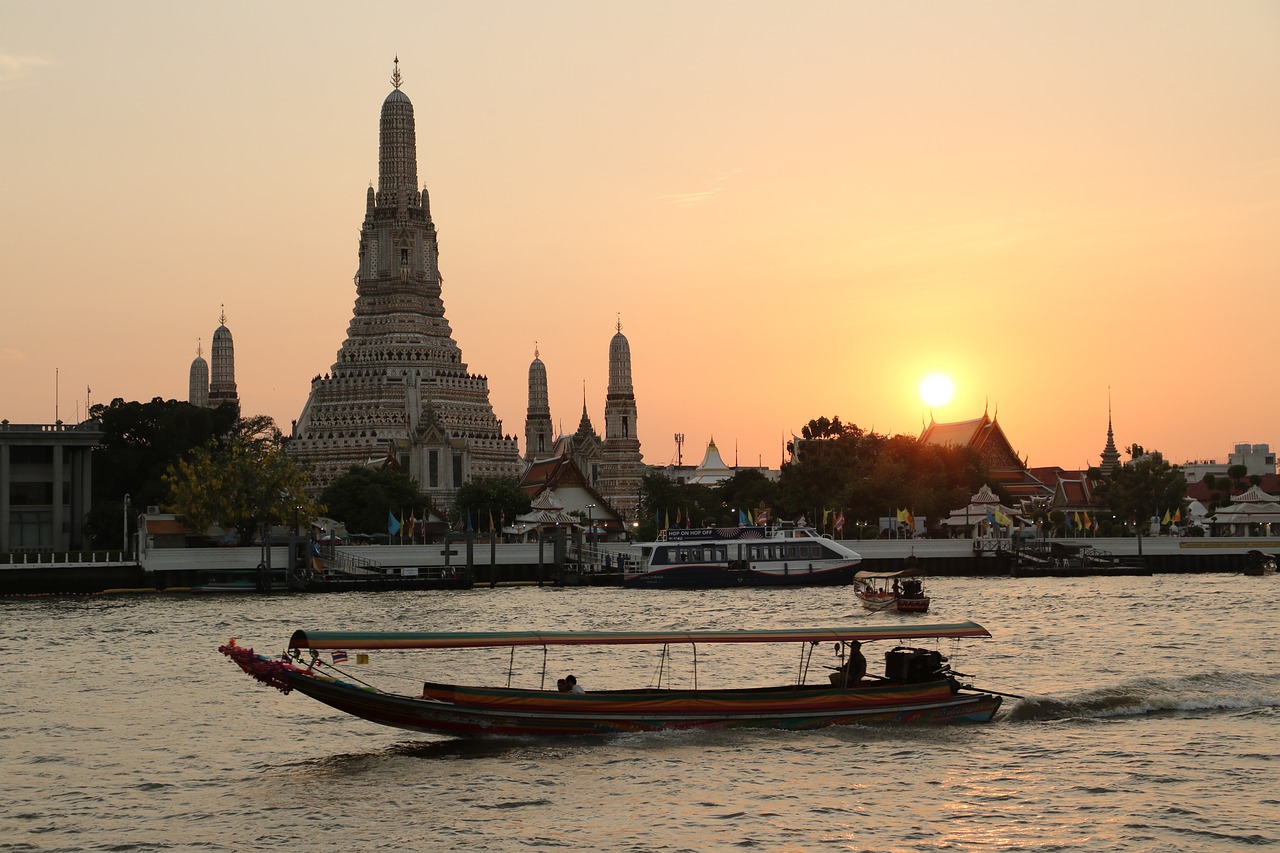 Wat Arun Bangkok riverside at sunset
