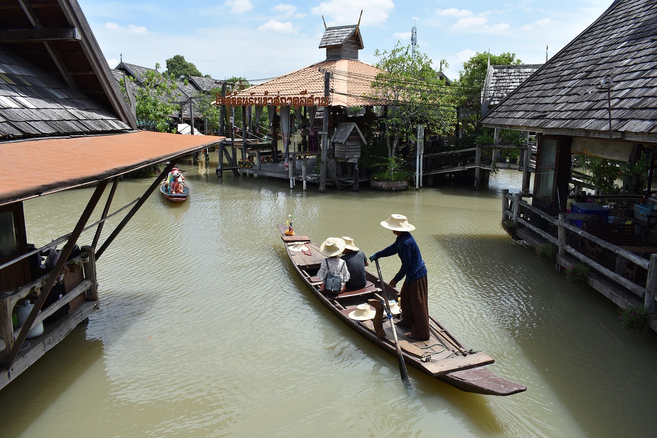 Pattaya Floating Market traditional wooden structures and boats