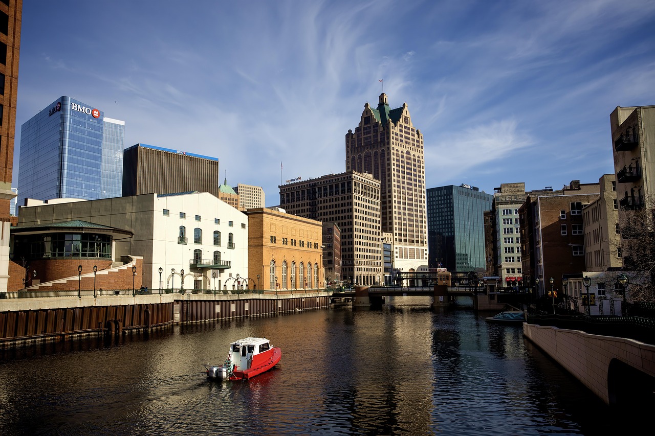 Milwaukee RiverWalk with riverside buildings and walkways